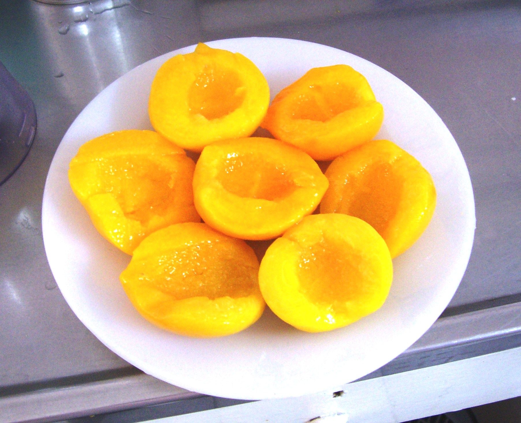 Pessegos em calda